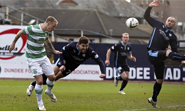 Celtic's Leigh Griffiths scores the first goal against Dundee in the Scottish Cup fifth round match